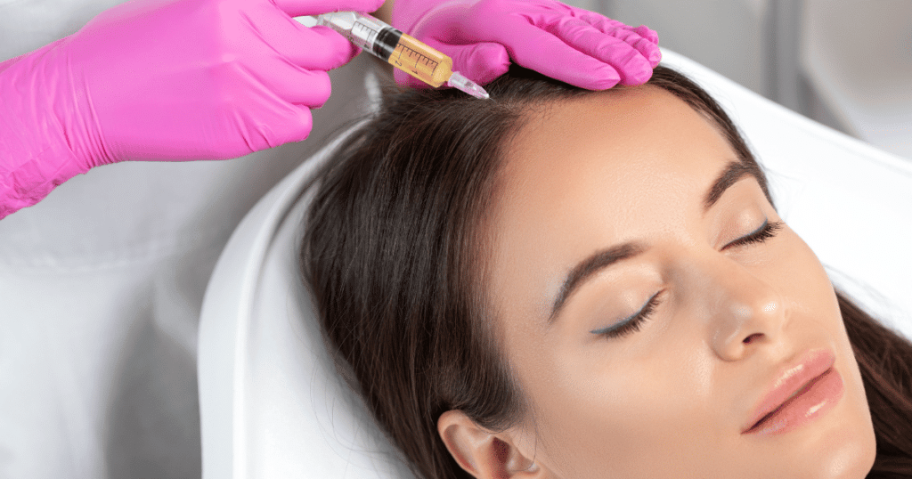 Woman undergoing PRP therapy for natural hair restoration.